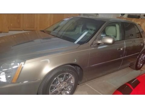 Tuscan Bronze ChromaFlair Cadillac DTS Luxury.  Click to enlarge.