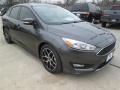 Front 3/4 View of 2015 Ford Focus SE Sedan #1