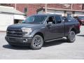 Front 3/4 View of 2015 Ford F150 Lariat SuperCab 4x4 #1