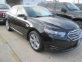 Front 3/4 View of 2015 Ford Taurus SEL #1