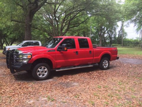 Vermillion Red Ford F250 Super Duty XLT Crew Cab 4x4.  Click to enlarge.