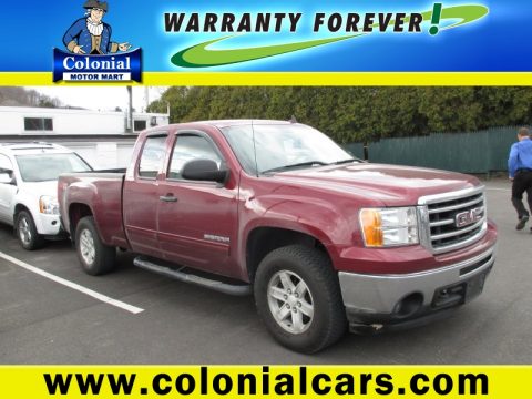 Sonoma Red Metallic GMC Sierra 1500 SLE Extended Cab 4x4.  Click to enlarge.