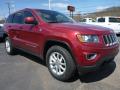 Front 3/4 View of 2015 Jeep Grand Cherokee Laredo 4x4 #8