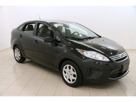 Tuxedo Black Metallic Ford Fiesta SE Sedan. Click to enlarge. Tuxedo Black Metallic Ford Fiesta SE Sedan. Click to enlarge.