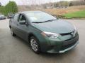 Front 3/4 View of 2014 Toyota Corolla LE #8