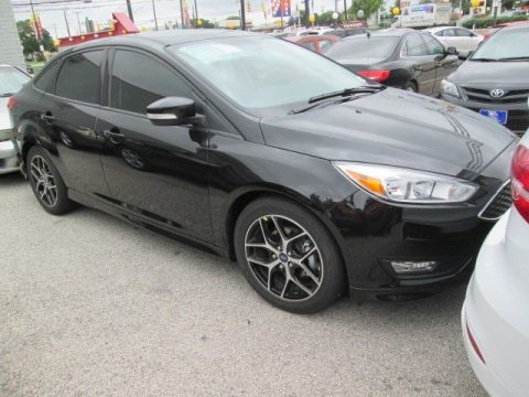 Tuxedo Black Metallic Ford Focus SE Sedan. Click to enlarge. Tuxedo Black Metallic Ford Focus SE Sedan. Click to enlarge.