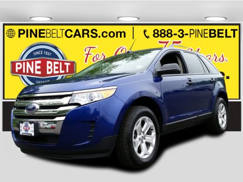 Deep Impact Blue Metallic Ford Edge SE AWD.  Click to enlarge.