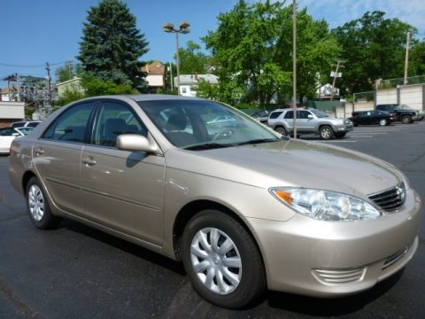 Beige Toyota Camry LE.  Click to enlarge.
