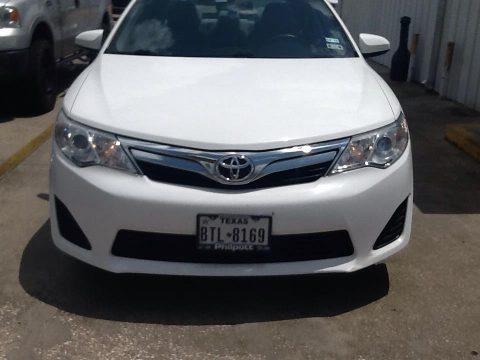 Super White Toyota Camry LE.  Click to enlarge.