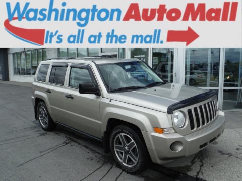 Light Sandstone Metallic Jeep Patriot Sport.  Click to enlarge.