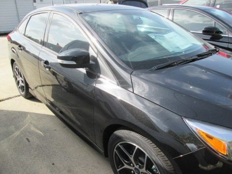 Tuxedo Black Metallic Ford Focus SE Sedan.  Click to enlarge.