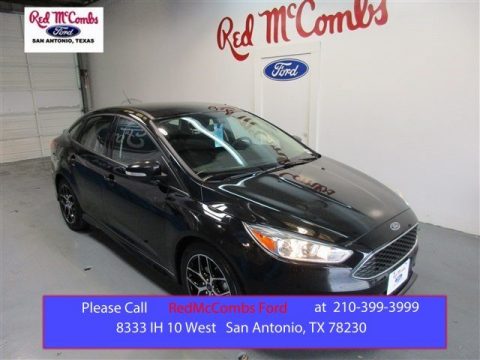 Tuxedo Black Metallic Ford Focus SE Sedan.  Click to enlarge.
