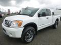 Front 3/4 View of 2015 Nissan Titan PRO-4X King Cab 4x4 #8