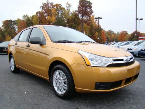 Amber Gold Metallic Ford Focus SE Sedan.  Click to enlarge.