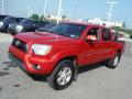 Front 3/4 View of 2013 Toyota Tacoma V6 TRD Sport Double Cab 4x4 #4