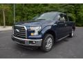 Front 3/4 View of 2015 Ford F150 XLT SuperCab #1