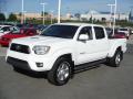 Front 3/4 View of 2013 Toyota Tacoma V6 TRD Sport Double Cab 4x4 #5