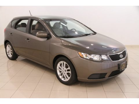 Metal Bronze Kia Forte EX 5 Door. Click to enlarge. Metal Bronze Kia Forte EX 5 Door. Click to enlarge.