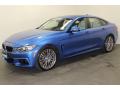Front 3/4 View of 2015 BMW 4 Series 428i xDrive Gran Coupe #5
