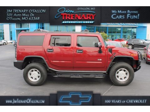 Red Metallic Hummer H2 SUV.  Click to enlarge.