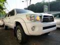 Front 3/4 View of 2006 Toyota Tacoma V6 Double Cab 4x4 #1