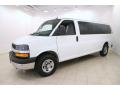 Front 3/4 View of 2014 Chevrolet Express 3500 Passenger Extended LT #3