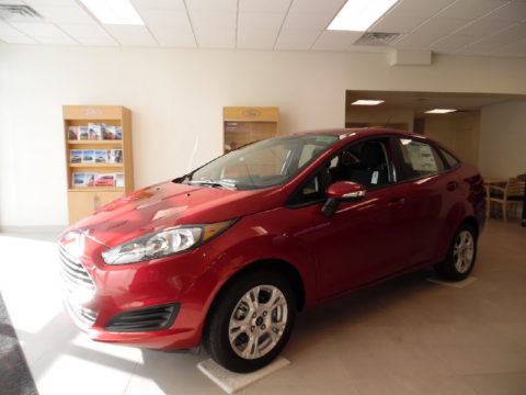 Ruby Red Metallic Ford Fiesta SE Sedan.  Click to enlarge.