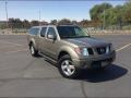 Front 3/4 View of 2007 Nissan Frontier LE Crew Cab 4x4 #1