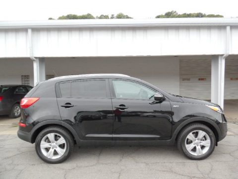 Black Cherry Kia Sportage LX AWD. Click to enlarge. Black Cherry Kia Sportage LX AWD. Click to enlarge.