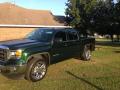 Front 3/4 View of 2014 GMC Sierra 1500 SLE Crew Cab 4x4 #1