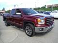 Front 3/4 View of 2014 GMC Sierra 1500 SLT Double Cab 4x4 #9