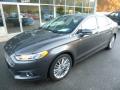 Front 3/4 View of 2015 Ford Fusion SE #7