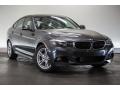 Front 3/4 View of 2016 BMW 3 Series 328i xDrive Gran Turismo #11