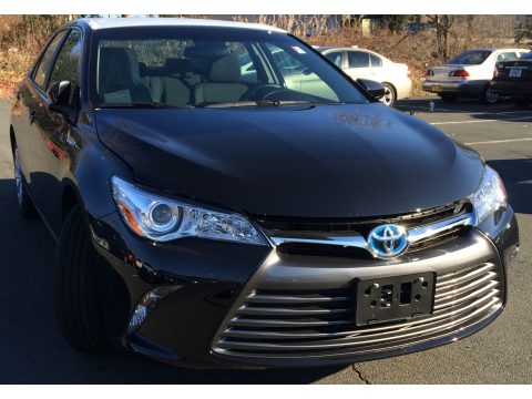 Midnight Black Metallic Toyota Camry Hybrid LE.  Click to enlarge.