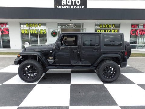 Black Jeep Wrangler Unlimited Sahara 4x4. Click to enlarge. Black Jeep Wrangler Unlimited Sahara 4x4. Click to enlarge.