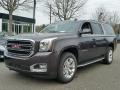 Front 3/4 View of 2016 GMC Yukon XL SLT 4WD #1