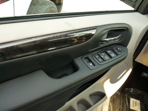 Bright White Dodge Grand Caravan SXT.  Click to enlarge.