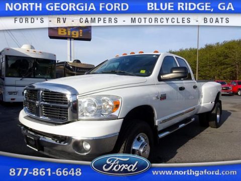 Bright White Dodge Ram 3500 SLT Quad Cab 4x4 Dually.  Click to enlarge.