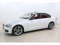 Front 3/4 View of 2013 BMW 3 Series 328i xDrive Sedan #3