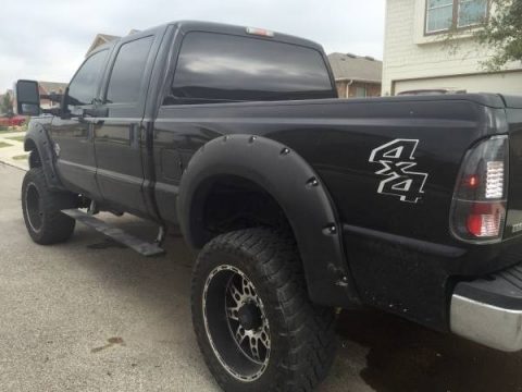 Tuxedo Black Metallic Ford F250 Super Duty XL Crew Cab 4x4.  Click to enlarge.
