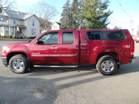 Sonoma Red Metallic GMC Sierra 1500 SLE Extended Cab 4x4.  Click to enlarge.