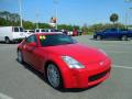 Front 3/4 View of 2005 Nissan 350Z Enthusiast Coupe #9