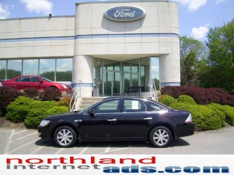 Black Clearcoat Ford Taurus SEL.  Click to enlarge.