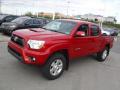 Front 3/4 View of 2014 Toyota Tacoma V6 TRD Sport Double Cab 4x4 #6