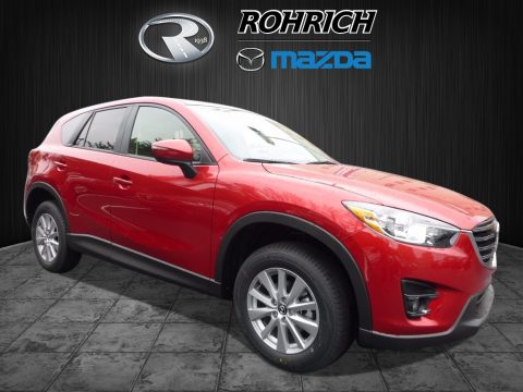 Soul Red Metallic Mazda CX-5 Touring AWD. Click to enlarge. Soul Red Metallic Mazda CX-5 Touring AWD. Click to enlarge.