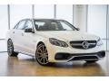 Front 3/4 View of 2016 Mercedes-Benz E 63 AMG 4Matic S Sedan #12