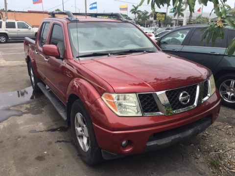 Red Brawn Nissan Frontier LE Crew Cab.  Click to enlarge.