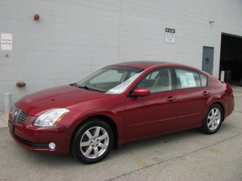 Red Opulence Metallic Nissan Maxima 3.5 SL.  Click to enlarge.