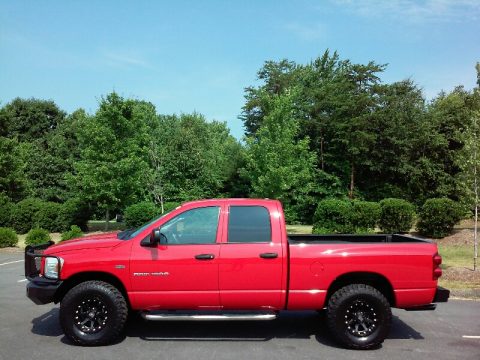 Flame Red Dodge Ram 1500 Sport Quad Cab 4x4.  Click to enlarge.