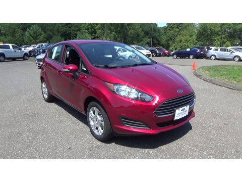Ruby Red Metallic Ford Fiesta SE Hatchback.  Click to enlarge.